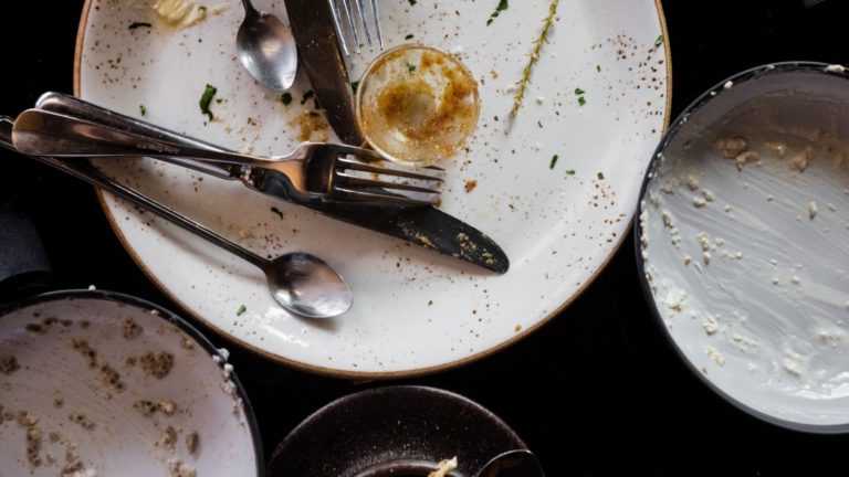 Dirty plates and cutlery